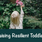 Toddler with long blonde hair reachese for roses in a bush. Raising Resilient Toddlers,